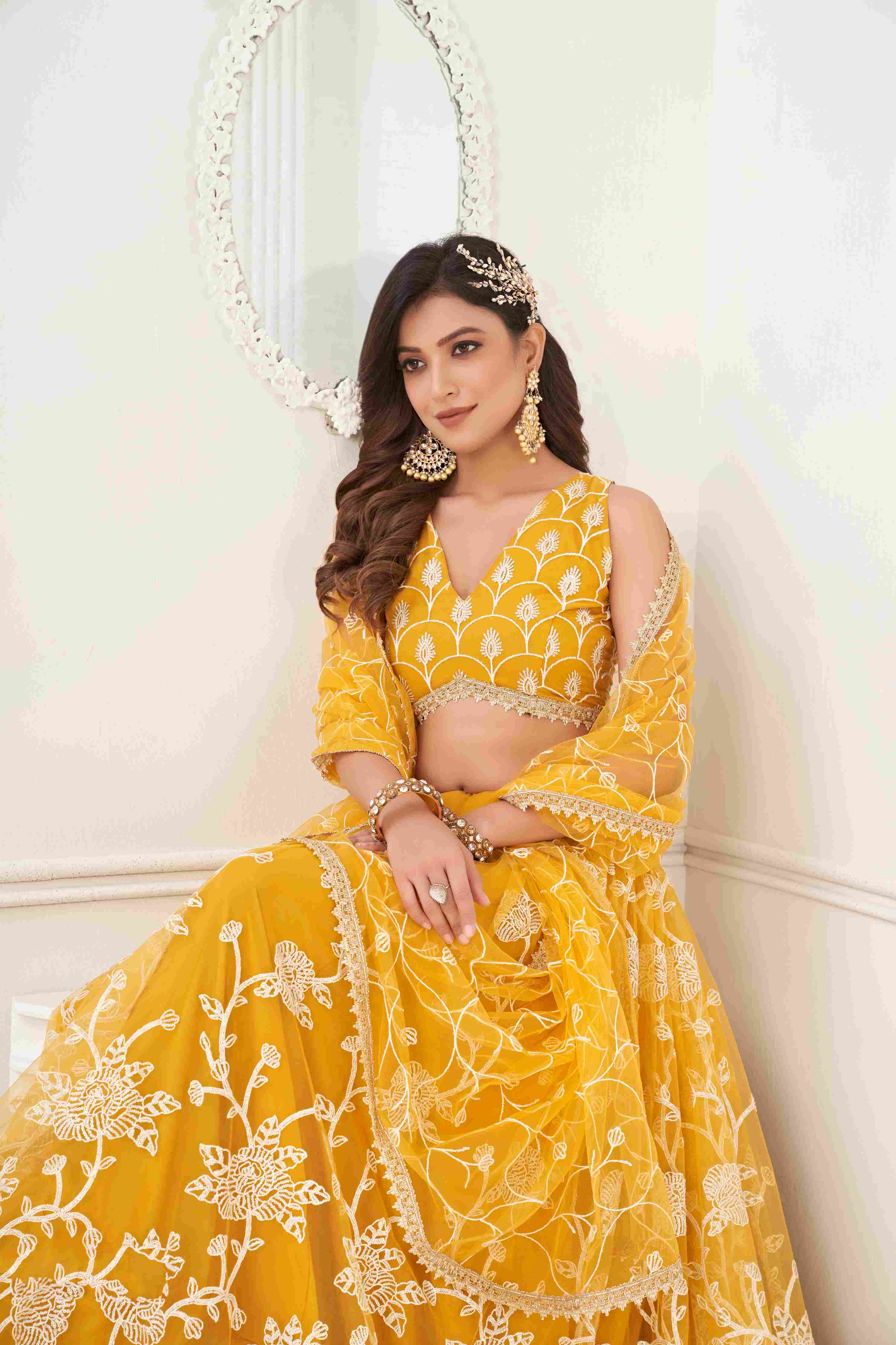 Mustard Yellow Sequins Embroidered Net Lehenga Choli