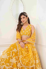 Mustard Yellow Sequins Embroidered Net Lehenga Choli