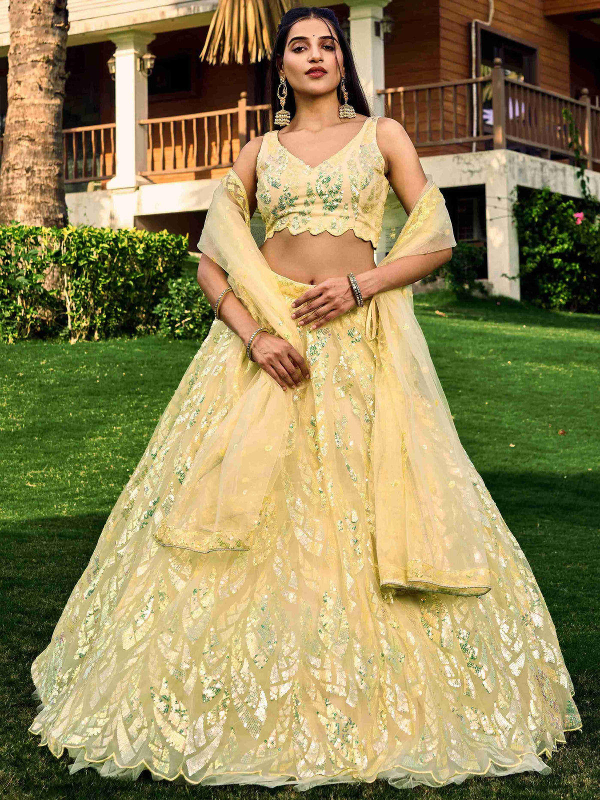 Yellow Soft Net Sequins Embroidered Lehenga Choli