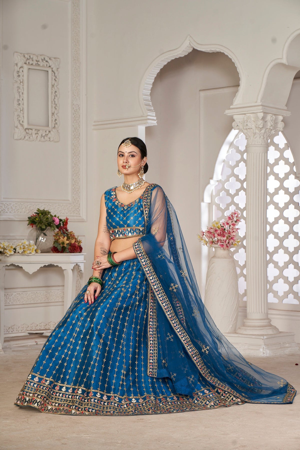 Teal Net Embroidery Lehenga Choli