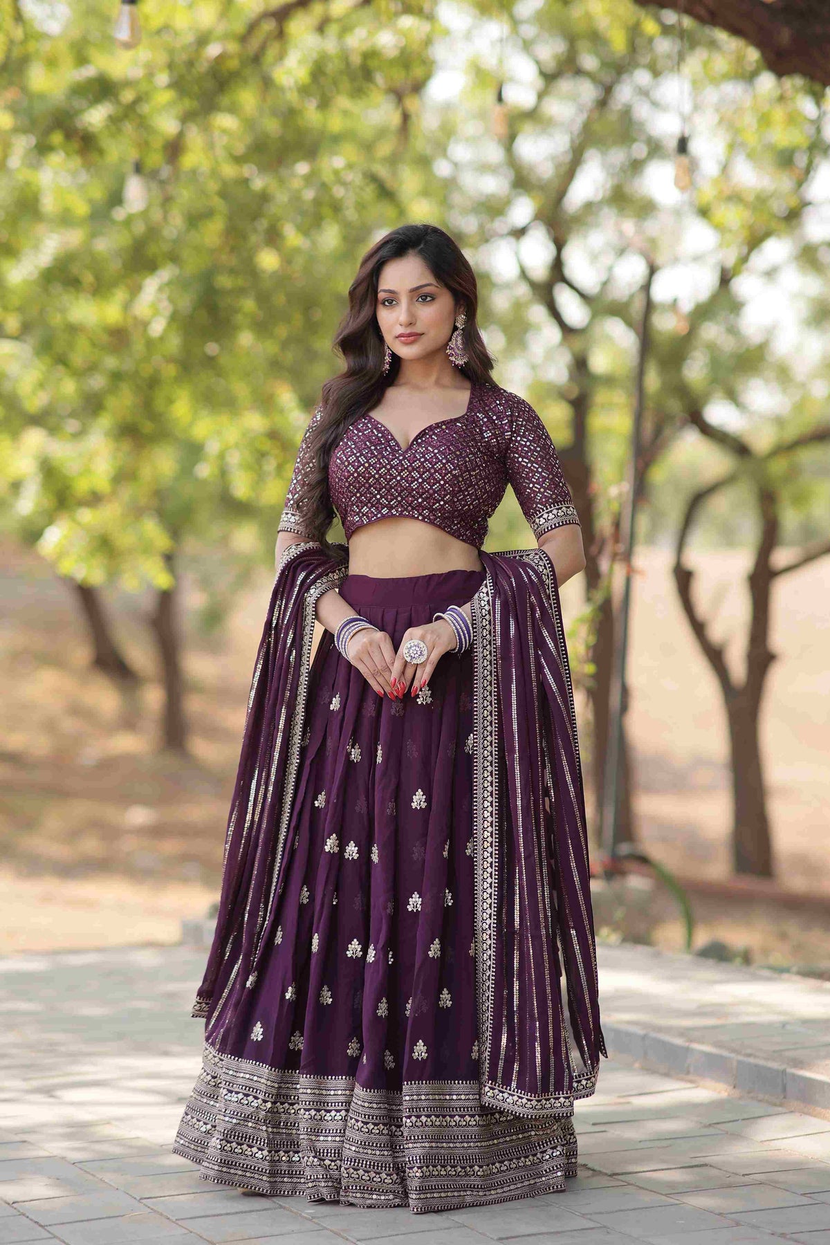 Purple Faux Georgette Sequins Embroidered Lehenga Choli