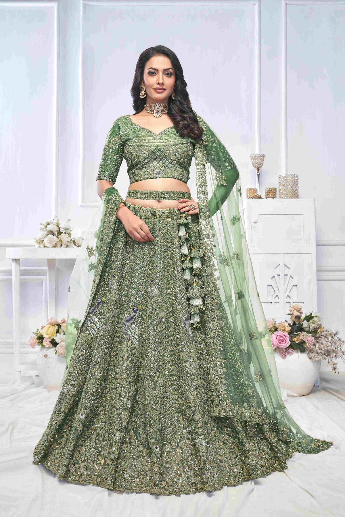 Green Soft Net Embroidered Sequins Peacock Motif Lehenga Choli