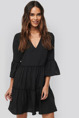 Black v-neck ruffle dress